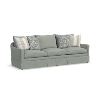 Eleanora Fabric Skirted Large Three-Cushion Sofa