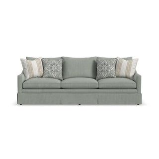 Eleanora Fabric Skirted Large Three-Cushion Sofa