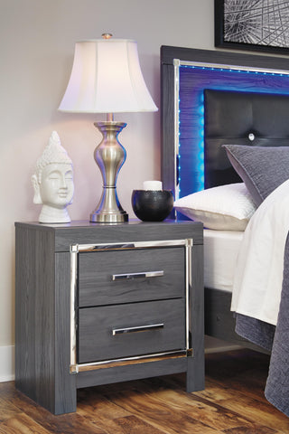 Lodanna Queen Upholstered Panel Storage Bed, Dresser, Mirror, and Nightstand