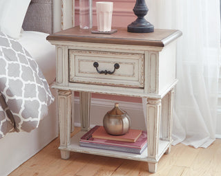 Realyn King Storage Bed, Dresser, Mirror and Nightstand