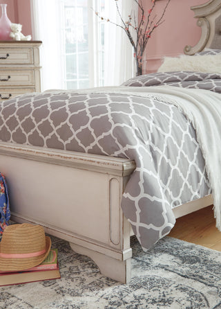Realyn Queen Upholstered Panel Bed