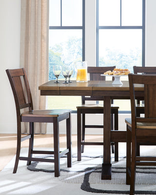 Rylandeen Counter Height Extension Dining Table and 6 Barstools